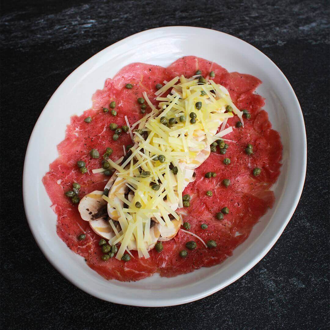 Carpaccio de res | Basilico plaza Herradura